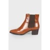 Perforated leather ankle boots