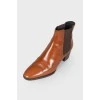 Perforated leather ankle boots