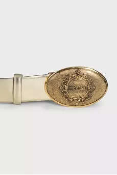Золотистий шкіряний ремінь з масивною пряжкою
