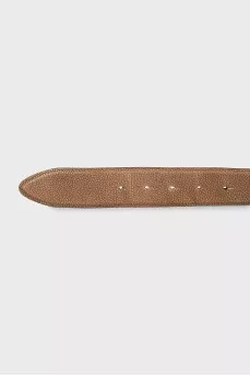 Leather belt with a massive figured buckle