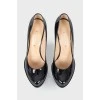 Black patent leather stiletto heels