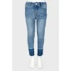 Children's jeans with the effect of torn below
