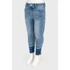 Children's jeans with the effect of torn below
