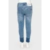 Children's jeans with the effect of torn below