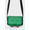 Green spiked bag