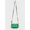 Green spiked bag