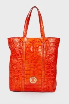 Bright leather bag with reptile embossing