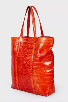 Bright leather bag with reptile embossing