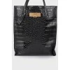Leather bag with reptile embossing