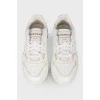 Wing leather sneakers