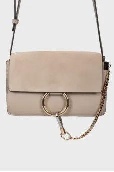 Neutral beige ring bag