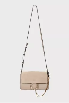Neutral beige ring bag