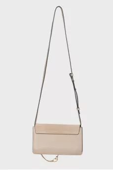 Neutral beige ring bag