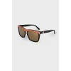 Sunglasses with brand logo in front