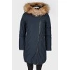 A down jacket with a fur hood