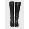 Leather boots with golden chain