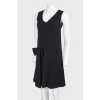 Straight cut dress with a bow in the front