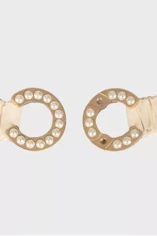 Belt with a logo, decorated with pearls