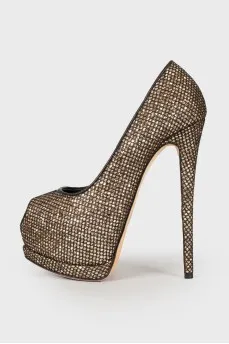 Golden shoes in a net
