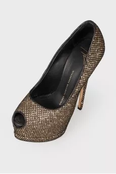 Golden shoes in a net
