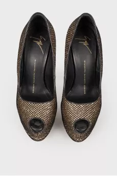 Golden shoes in a net