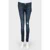 Ripped and worn effect jeans