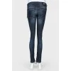Ripped and worn effect jeans