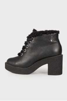 Leather boots on fur