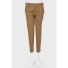 Brown trousers with arrows