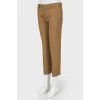 Brown trousers with arrows