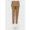 Brown trousers with arrows