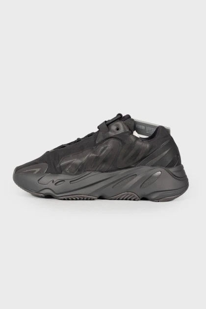 Black textile sneakers with tag