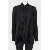 Translucent blouse with pleated details