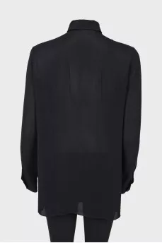 Translucent blouse with pleated details