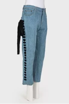 Jeans with black velvet lacing