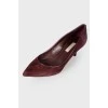 Burgundy suede pumps