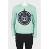 Green sweatshirt with print