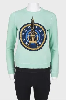 Green sweatshirt with print