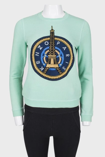 Green sweatshirt with print