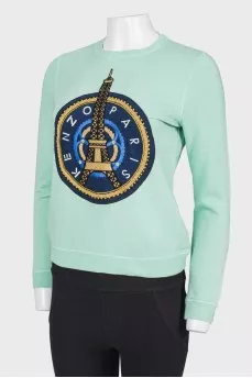 Green sweatshirt with print