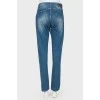 Jeans with pearl effect beads and tag