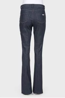 Broken jeans with stripes