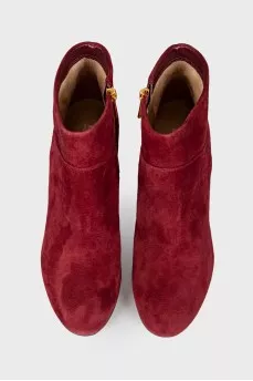 Suede ankle boots with rhinestone heel and tag