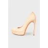 Curved suede stilettos
