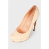 Curved suede stilettos