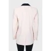 Pink jacket with black lapels