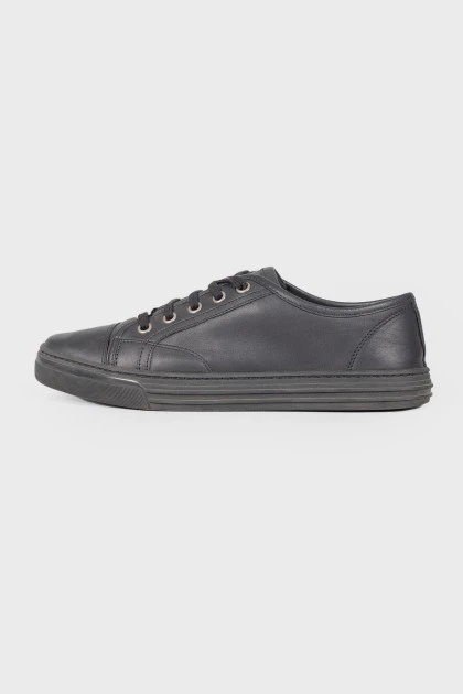 Black eyelet sneakers