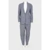 Striped suit with golden buttons