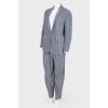 Striped suit with golden buttons