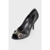 Shoes with embossed brand logo